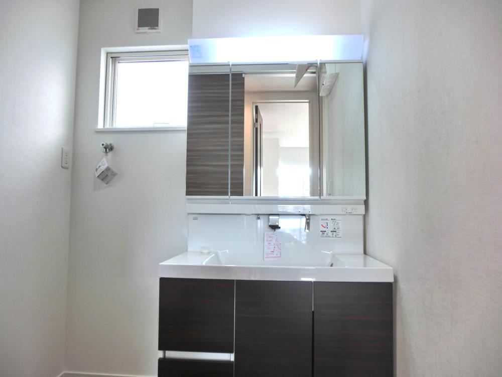 Wash basin, toilet. D Building