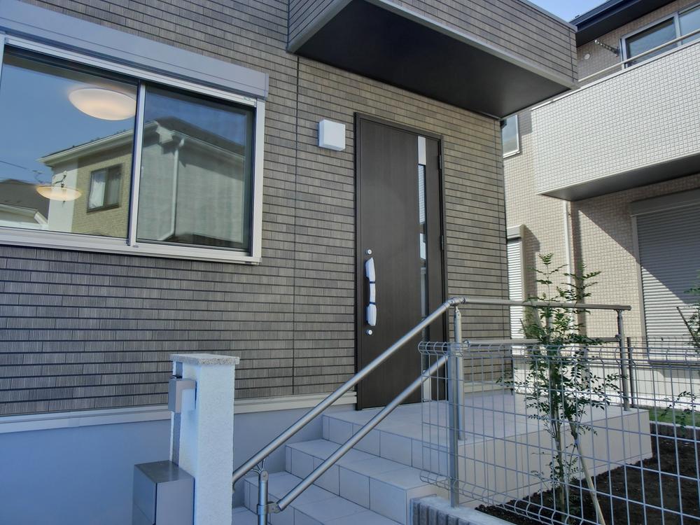 Entrance. It is a photograph that was taken of the east entrance in the evening.