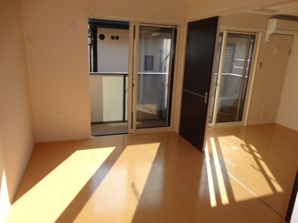 Other room space. The living room is a picture