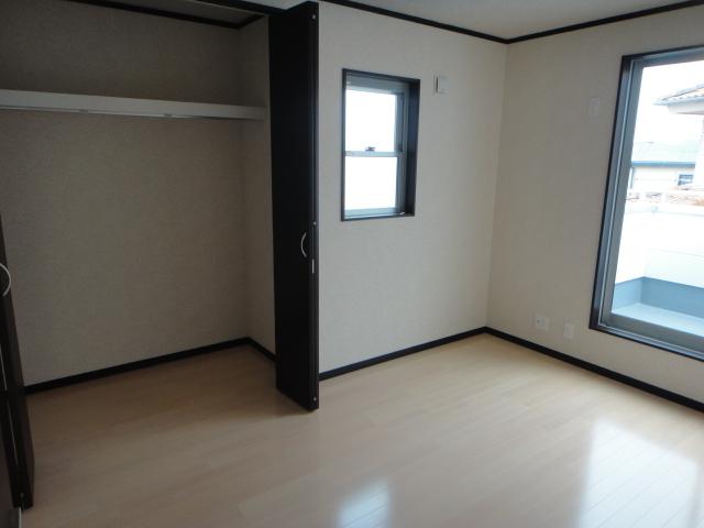 Non-living room. Second floor bedroom. There closet.