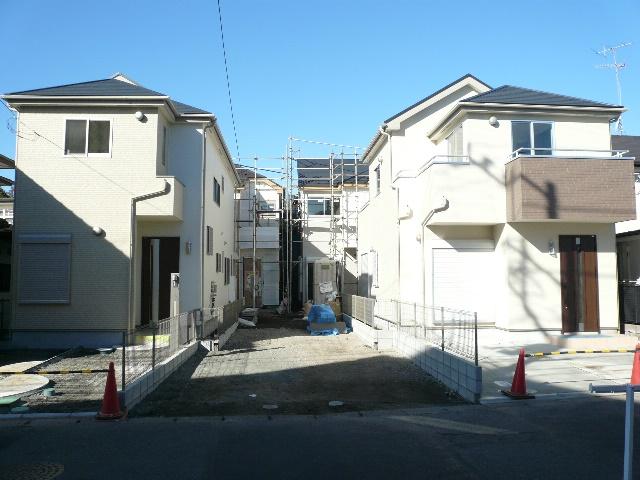 Local photos, including front road. All four buildings sell the remaining two buildings