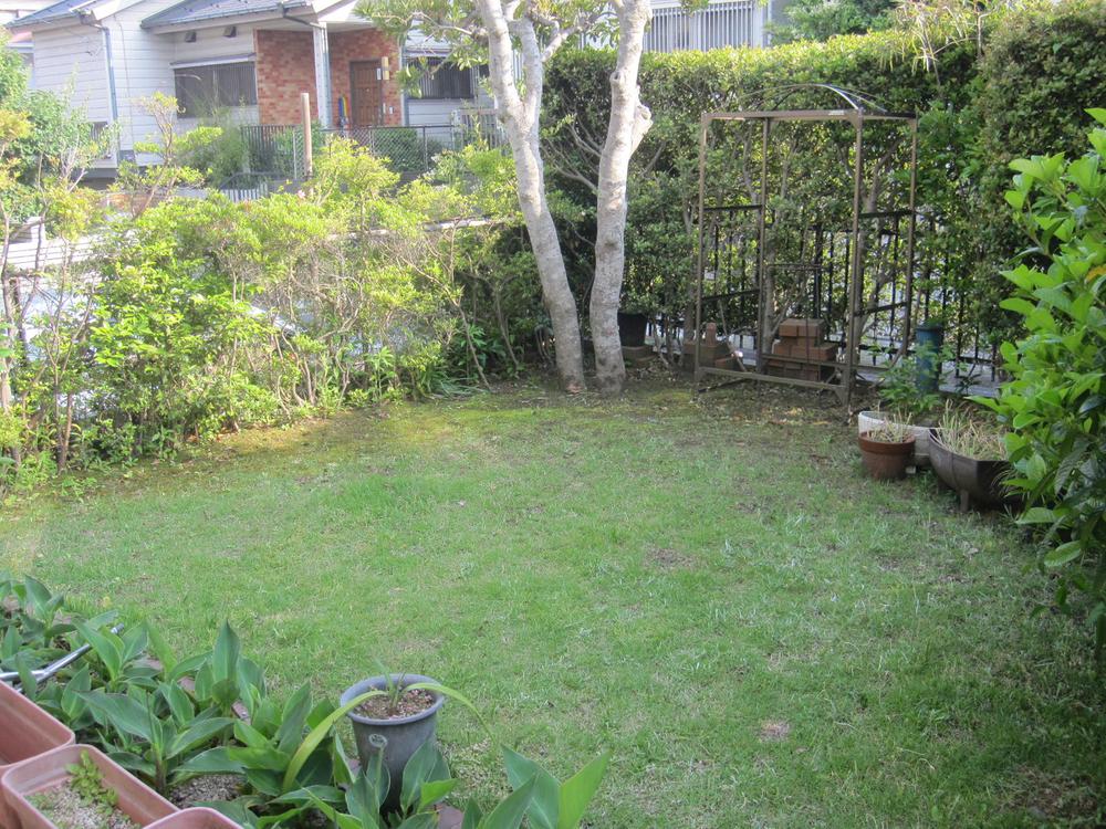 Other local. Currently, On the southwest side facing the road there is a lush garden and a car port.