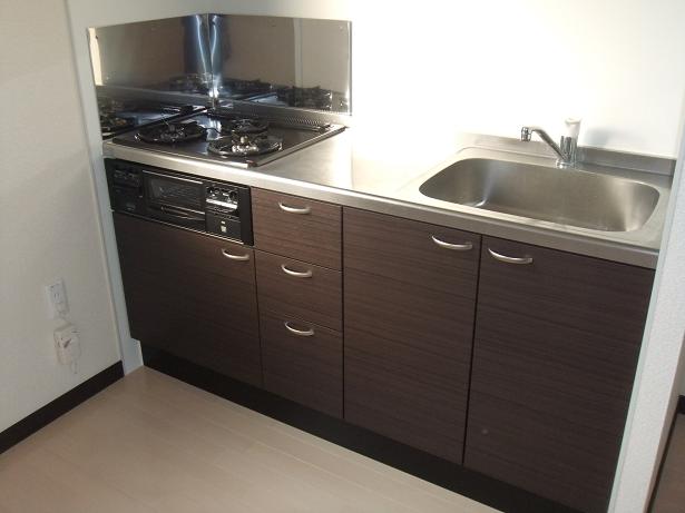 Kitchen. Stove is located in a three-necked. With grill!