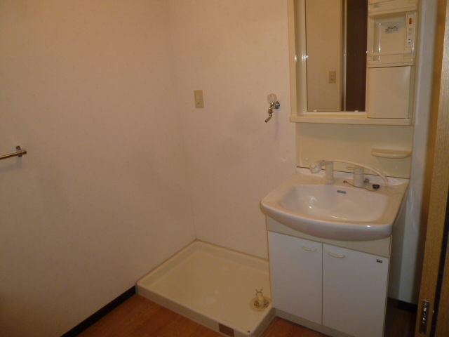 Washroom. There are washing machine storage room next to the independent wash basin