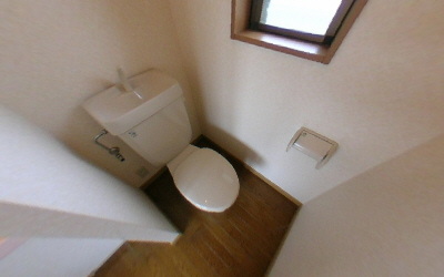 Toilet. There is a window in the toilet