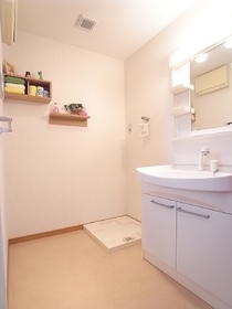 Washroom. It was wall-mounted furniture installation.