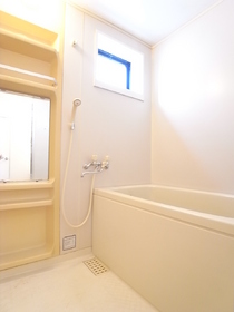 Bath. There is a window in the bathroom