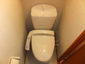 Toilet. Warm water washing toilet seat equipped.