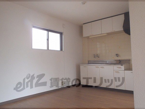 Living and room. With a west-facing window.