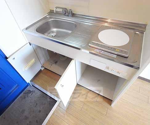 Entrance. This kitchen storage.