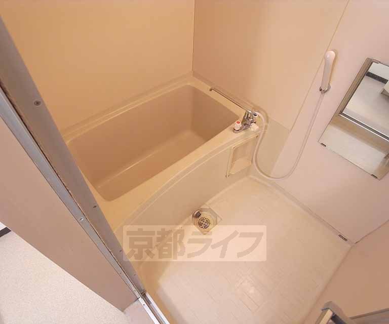 Bath. It is neat bathroom.