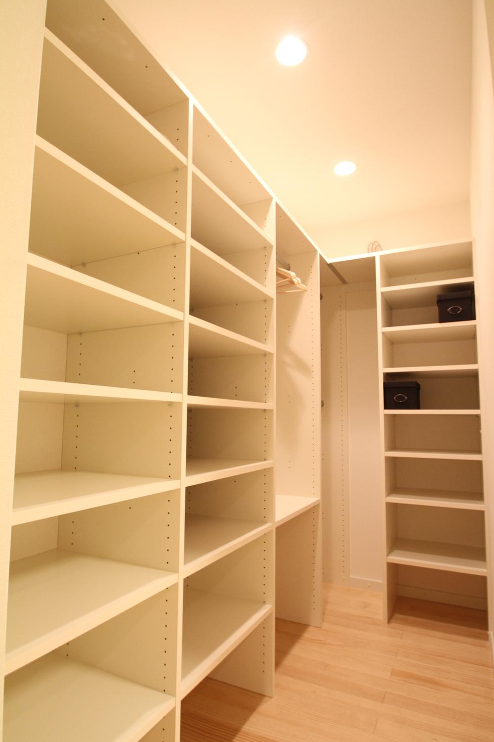 Receipt. Walk-in closet storage rack is plenty (model house)