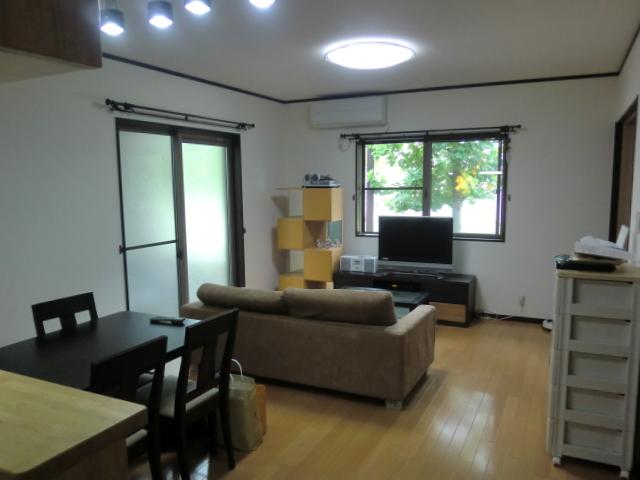 Living. Dining and living room as seen from the kitchen.