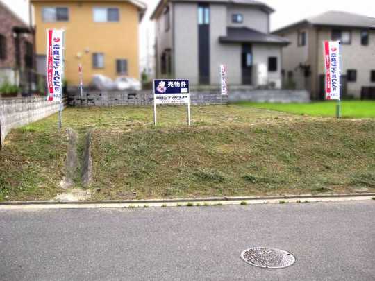 Local land photo. Front road is with sidewalk.