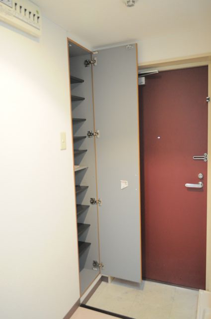 Entrance. With a shoe box