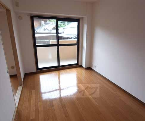 Living and room. It is a bright room.