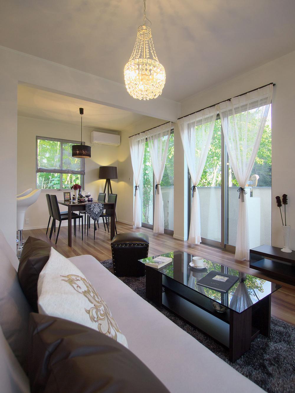 Model house photo. Green scenery reflected in the window, Bring peace to the day-to-day life. 