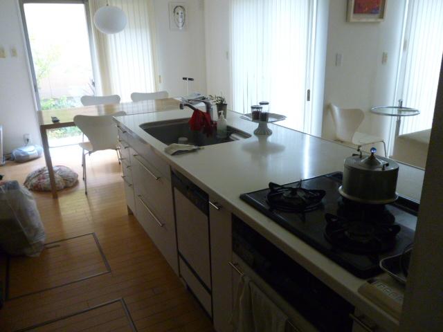 Kitchen. Stylish island kitchen overlooking the LDK