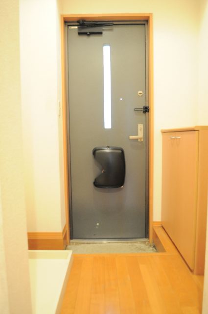 Entrance. With a shoe box