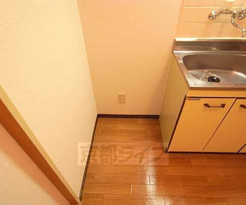 Other room space. Refrigerator is a space.