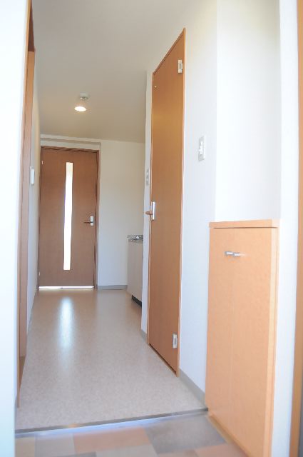 Entrance. With a shoe box