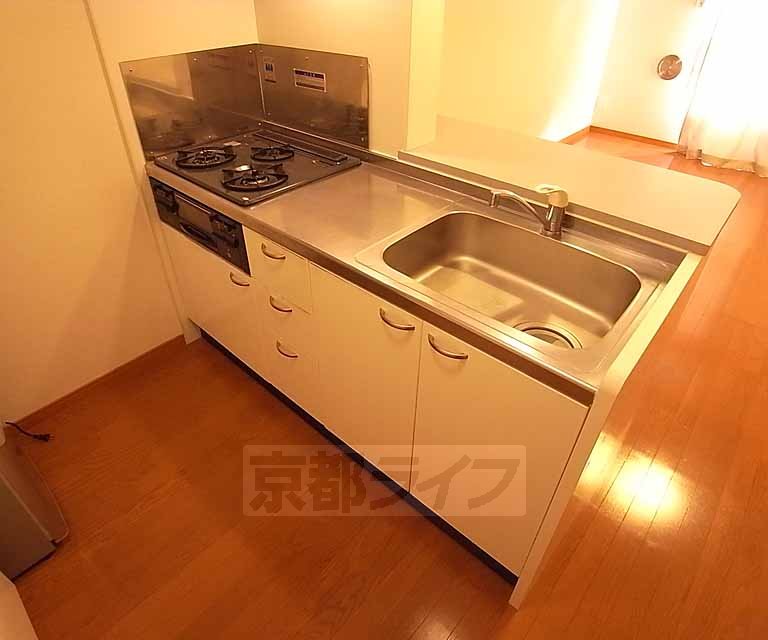 Kitchen. 3-neck is a gas stove with a system Kitchen.