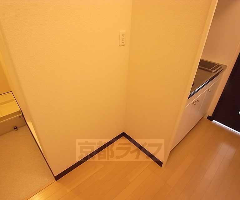 Kitchen. Refrigerator is a space.