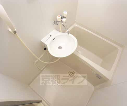 Bath. It is a bath with a bathroom dryer.