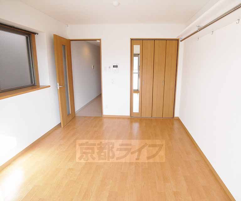 Living and room. It is spacious.