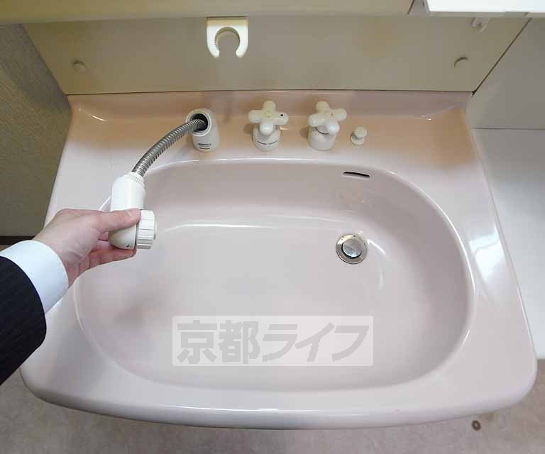 Other Equipment. It is a shampoo dresser is happy