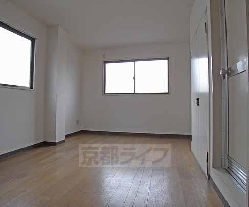 Living and room. It is the window a lot of room.