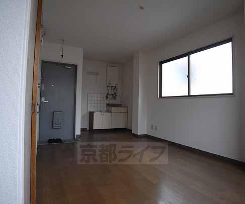 Living and room. I am happy that there is a window.