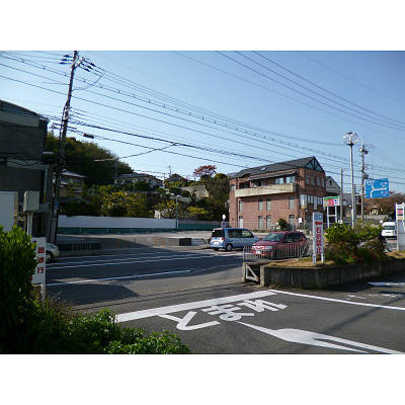 Local land photo. The subject real estate as seen from the front road