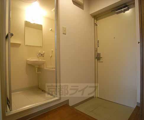 Living and room. Is the entrance and the bath.