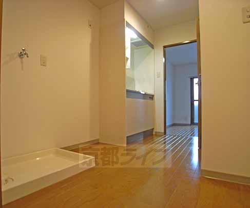 Living and room. A little kitchen space of spread.