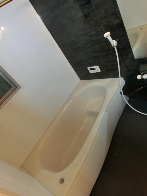 Bathroom. Slowly in the bath of shiny