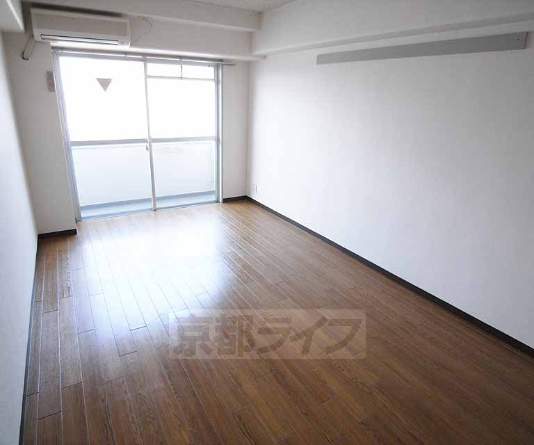 Living and room. It is a beautiful indoor flooring.