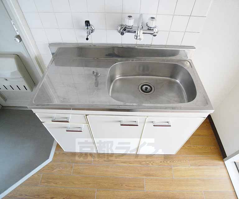 Kitchen. It is sink a big kitchen.