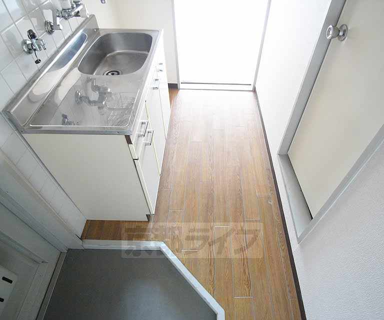 Living and room. It is around the entrance.