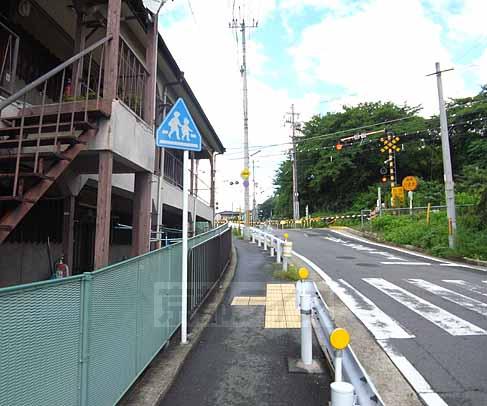 View. Road adjacent to the property