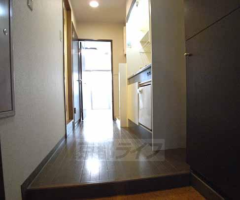 Entrance. From the front door, Kitchen space.