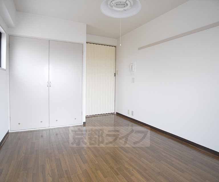 Living and room. It is spacious.