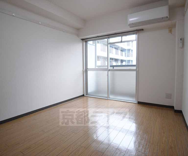 Living and room. It is spacious.