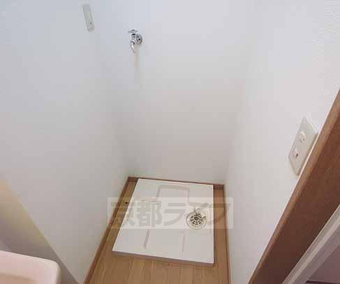 Washroom. This washing machine Storage.