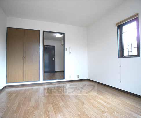 Living and room. There is a small window only corner room.