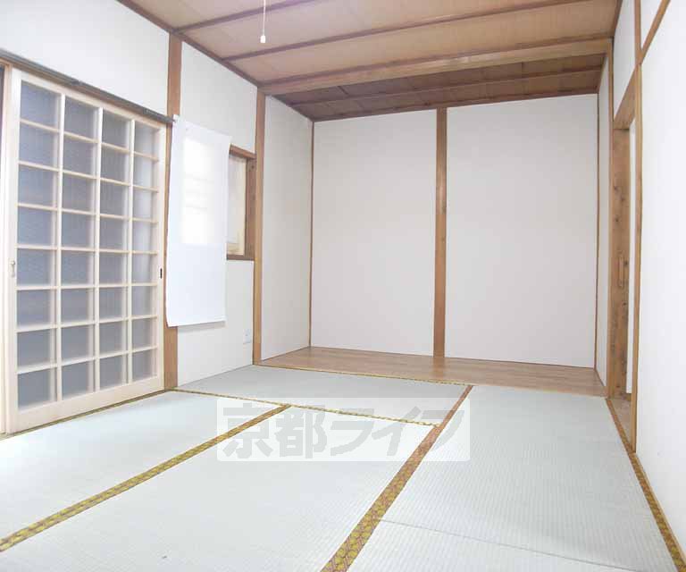 Living and room. It is spacious.