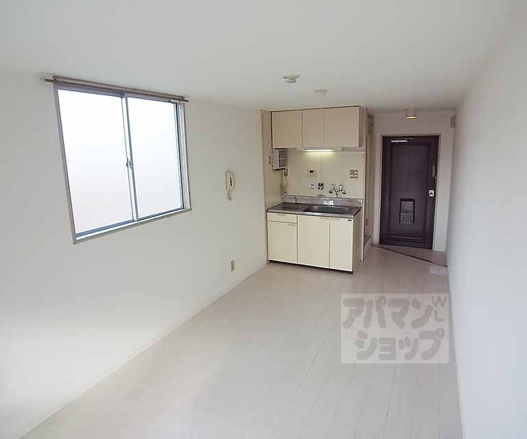 Living and room. In bright rooms with white floor!