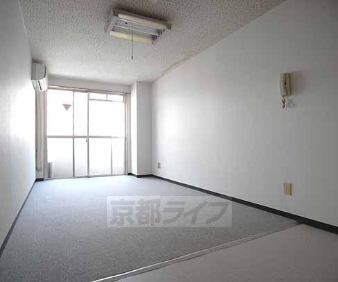 Living and room. It is quite wide