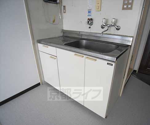 Kitchen. Sink is spread