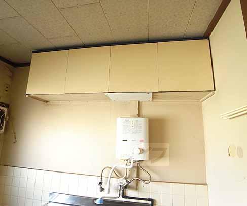 Kitchen. There is also a shelf above.